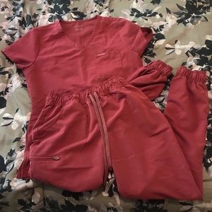 Small Jaanuu scrubs in Warm Berry